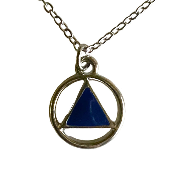 Necklace with a blue triangle pendant on a white stone background