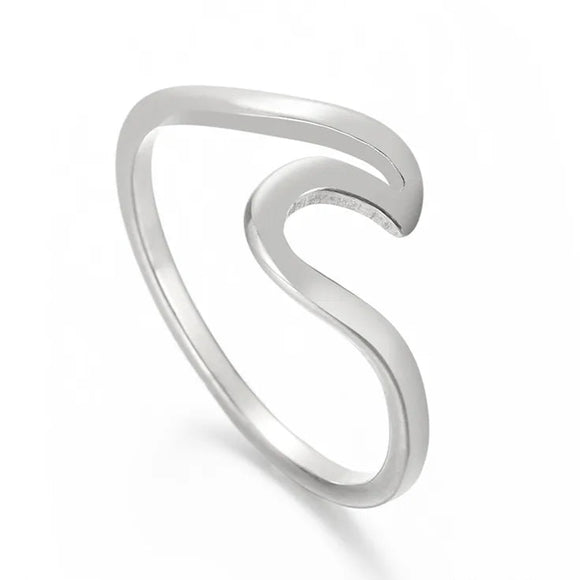 Silver Serenity Ring™with a wavy design on a white background
