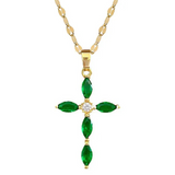 Gold necklace with a green gemstone pendant on a white background